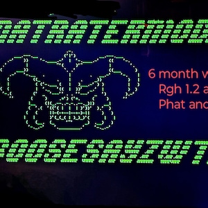 May include: A green pixelated image of a muscular figure with the text "6 month warranty Rgh 1.2 and 3.0 Phat and slims!" in red.