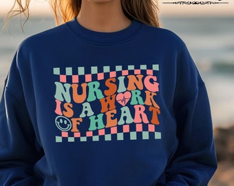Nursing Is A Work Of Heart Sweatshirt, Nurse Sweater, Women's Nurse Crewneck, Nurse Gift, Nurse Sweatshirt, Nurse Student Gift Sweatshirt