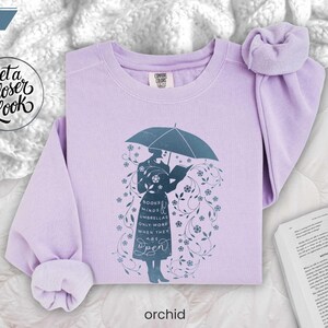 ORCHID folded flat lay lavender book lover sweatshirt styled for cozy winter mornings, perfect gift for teachers and readers