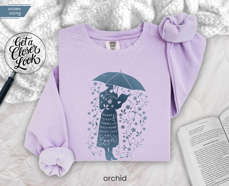 ORCHID folded flat lay lavender book lover sweatshirt styled for cozy winter mornings, perfect gift for teachers and readers