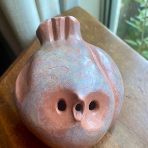 Bird-shaped clay ocarina