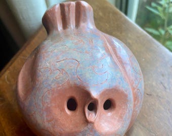 Bird-shaped clay ocarina