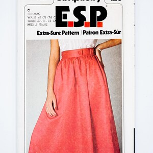 May include: Simplicity sewing pattern 9027 featuring a red skirt design. The pattern cover includes the text "ESP" and "Extra-Sure Pattern / Patron Extra-Sûr". The waist measurements are 67-76 cm.