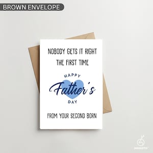 May include: A Father's Day greeting card with a brown envelope. The card reads "NOBODY GETS IT RIGHT THE FIRST TIME" and "HAPPY Father's DAY FROM YOUR SECOND BORN" in black and blue text. The words "Father's" is in a cursive font.