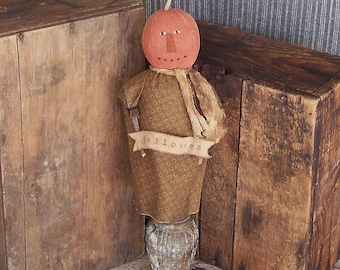 Primitive Pumpkin Make-Do Doll on Vintage Metal Base