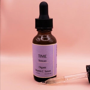 Organic Vitamin C Serum in dark bottle.