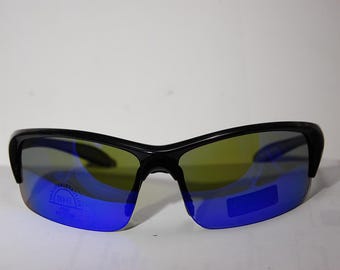 May include: Black sunglasses with blue mirrored lenses. The lenses have a slight yellow tint.