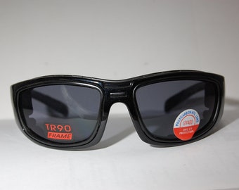 May include: Black sunglasses with a TR90 frame and polycarbonate lenses that offer UV400 protection.