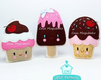 May include: Three felt ornaments shaped like a cupcake, ice cream cone, and popsicle. Each ornament has a smiling face and is decorated with sprinkles, a cherry, and a bow. The ornaments are labeled "Casa Magubako" and are part of a PDF pattern.