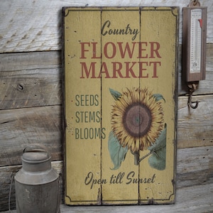 Bord bloemenmarkt, decorbord zonnebloem, decor landschapsdecor, decor bloem, decor houten hut, decor houten hut, decor houten lodge, decor landschapsdecor, decoratie houten oude borden