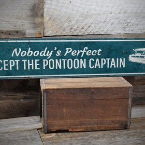 a sign that says nobody's perfect except the pontoon captain