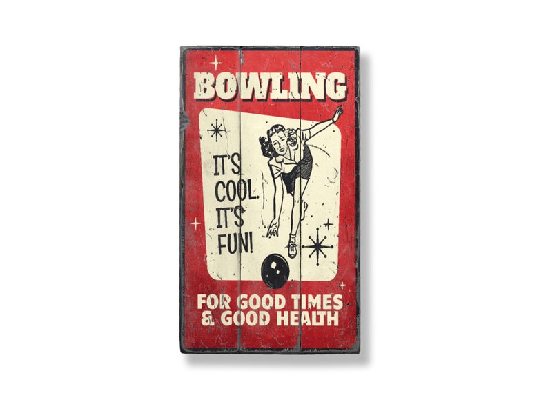 a bowling sign is hanging on a wall