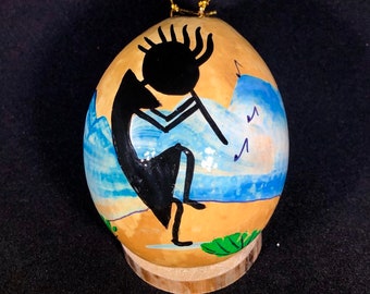 Kokopelli flute player Hand-Painted Gourd Christmas Ornament, Santa Fe, New Mexico artist Sandy Short www.handpaintedgourds.com.