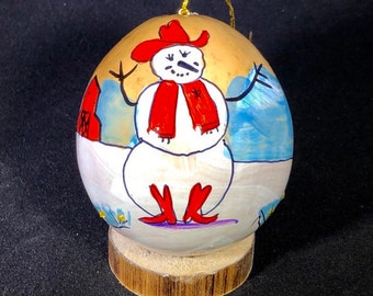 Western snowman ornament. Hand–painted Gourd Christmas Ornament by artist Sandy Short www.handpaintedgourds.com. Original artwork. Light wei