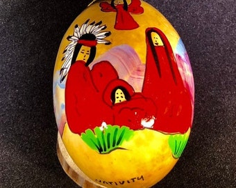 Red nativity. Hand-Painted Gourd Christmas Ornament, Santa Fe, New Mexico artist Sandy Short www.handpaintedgourds.com Watercolor on gourd.