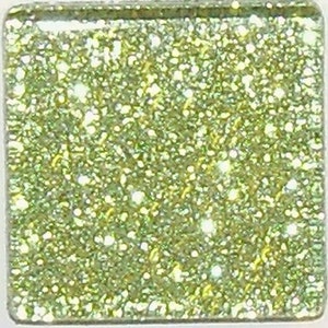 May include: A square, glittery tile with a light green hue. The surface is densely packed with sparkling particles, creating a shimmering effect. The edges of the tile are smooth and slightly rounded.