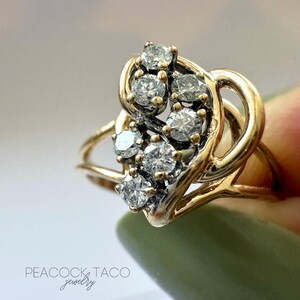 vintage 14kt gold diamond swirl heart ring