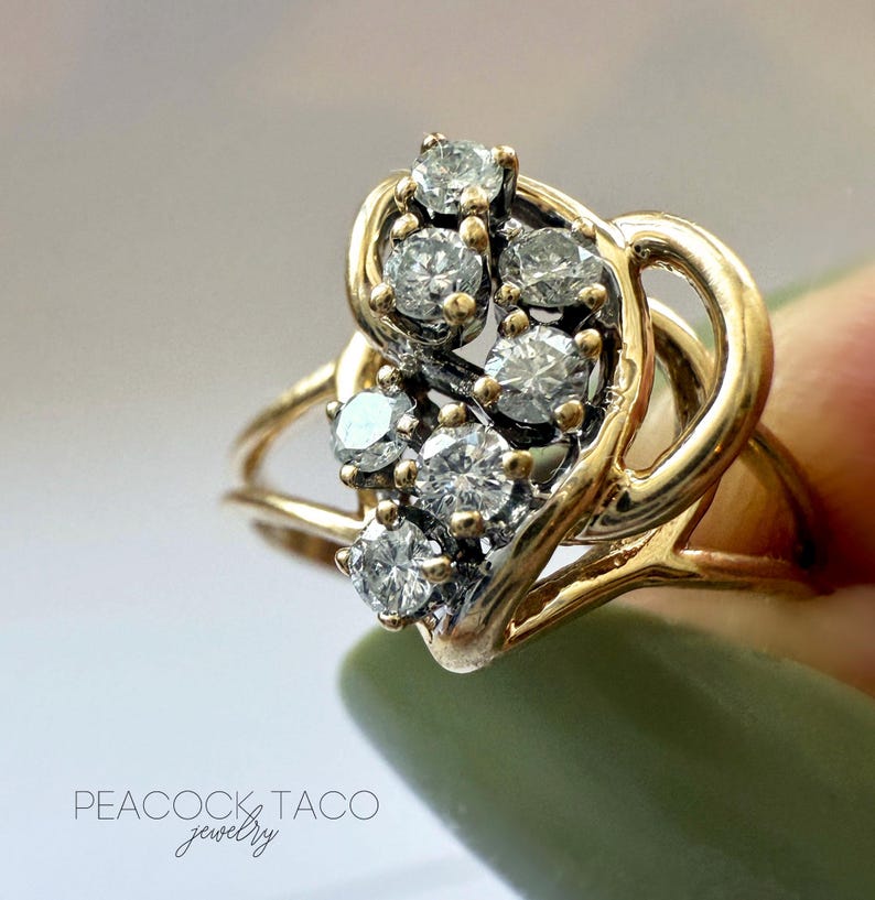 vintage 14kt gold diamond swirl heart ring