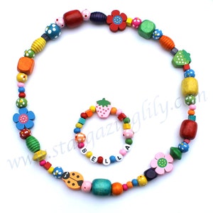 Little Girls Colorful Chunky Wood beaded bracelet. Necklace and bracelet set available. Strawberries, Flowers, Ladybug beads