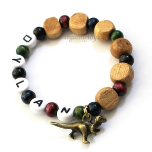 Dinosaur Party Favor Charm bracelet. Wood beads, Personalized name bracelet. Party Favor for boys. Little boy dinosaur bracelet jewelry Wood Beads