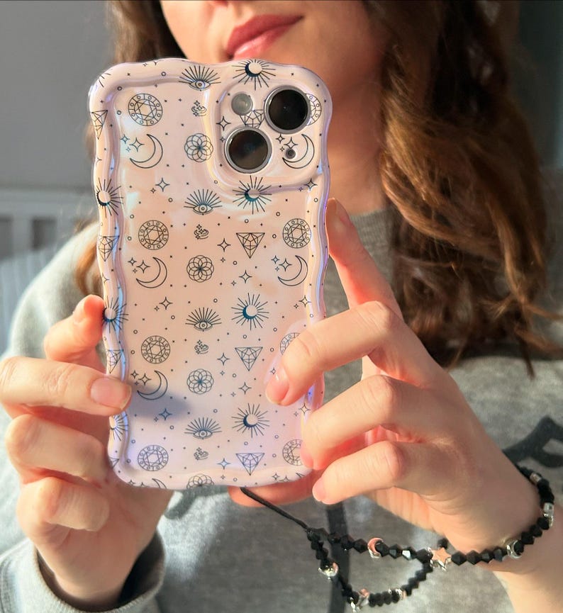 celestial iphone case in lilac and black