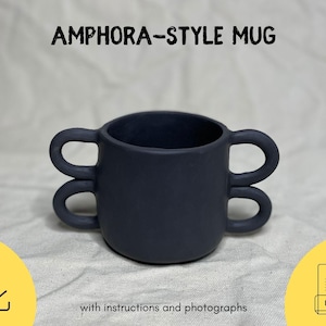May include: A dark gray ceramic mug with a unique amphora-style design. The mug has three handles and is perfect for holding a warm beverage.