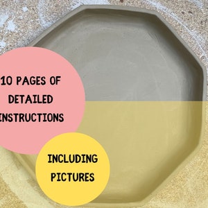 May include: A light gray octagonal ceramic tray with a smooth surface. The tray is on a wooden surface with a yellow and pink background. The text "10 PAGES OF DETAILED INSTRUCTIONS INCLUDING PICTURES" is on the background.