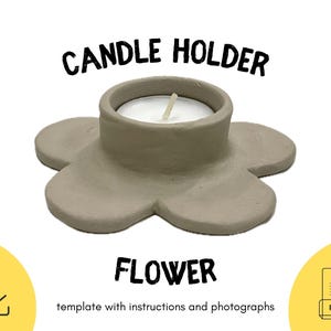 Könnte beinhalten: Ein grauer Kerzenhalter aus Keramik in Form einer Blume mit fünf Blütenblättern. Der Halter hat eine kleine, runde Vertiefung in der Mitte, um ein Teelicht zu halten.