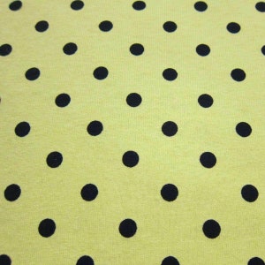 Black Dots On Yellow Cotton Jersey Fabric