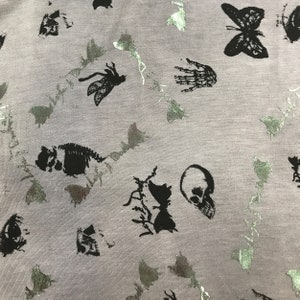 Life and Death on Gray Cotton/Spandex Jersey Fabric
