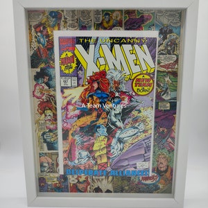 May include: A framed comic book cover featuring the X-Men. The cover is a collage of different comic book panels, with the main image showing the X-Men in action. The title of the comic is "The Uncanny X-Men" and the issue number is 281. The text "A New Team is Born!" and "Desperate Alliances!" are also visible on the cover.