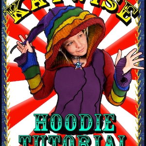 Könnte beinhalten: Ein farbenfrohes Poster mit dem Text "KATWISE HOODIE TUTORIAL" in einer Zirkus-Schriftart. Das Poster zeigt eine Person, die einen regenbogenfarbenen Kapuzenpullover mit einer lila Basis und einer regenbogenfarbenen Mütze trägt.