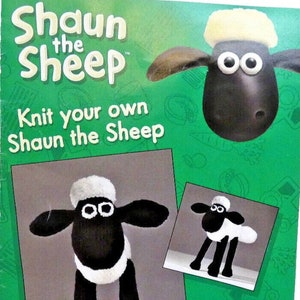 May include: A craft kit featuring Shaun the Sheep. The kit includes instructions, yarn, and needles to knit a Shaun the Sheep figure. The packaging is green with images of the finished product and the text "Shaun the Sheep".