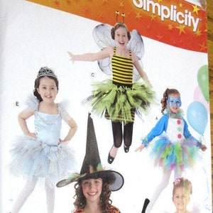 May include: Simplicity sewing pattern number 0422 for children's costumes. The pattern includes five different costumes: a witch, a bee, a fairy, a clown, and a ballerina. The pattern is for sizes K5, 7, 8, 10, 12, and 14.