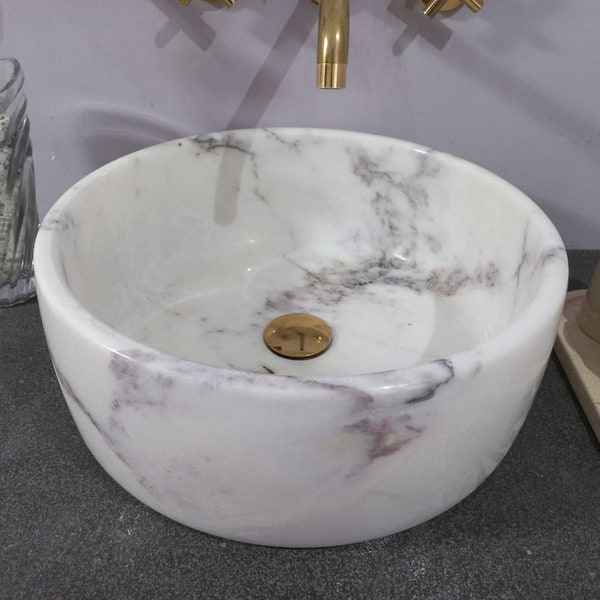 Round white marble sink