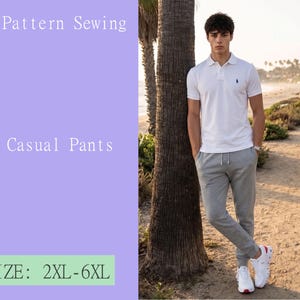 May include: A PDF sewing pattern for knit casual pants in sizes 2XL-6XL. The image features a white polo shirt and grey sweatpants with a drawstring waist, shown on a person standing against a palm tree on a sandy path near the beach.