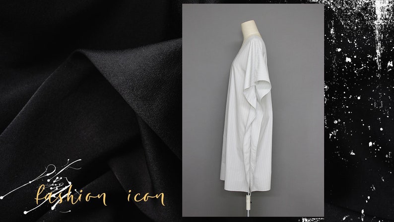 May include: A white, striped, long-sleeved dress with a loose fit. The dress is on a white mannequin against a gray background.