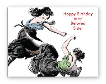 Może przedstawiać: Kartka urodzinowa z humorystyczną ilustracją dwóch kobiet walczących. Tekst na kartce brzmi "Happy Birthday to my Beloved Sister."
