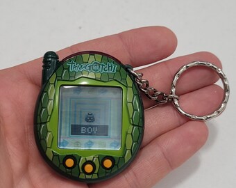 Tamagotchi V3 Green Reptile Snake Skin Shell 2004 Bandai Rare!