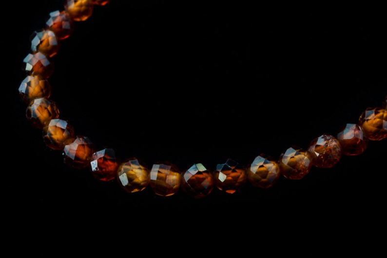 8 Strand 2mm Orange Garnet Round Faceted Bead