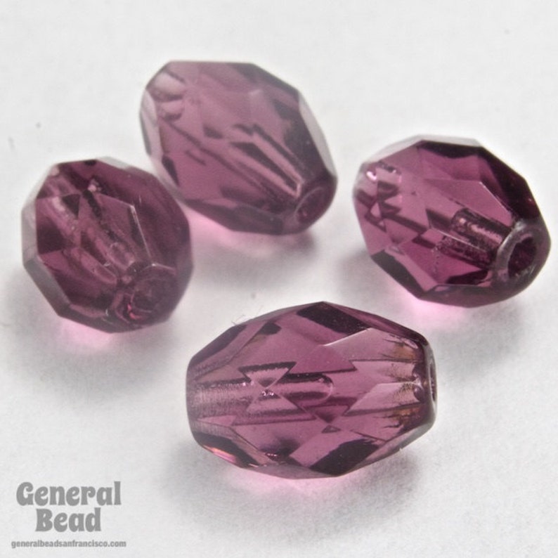 #GCU002 150 Pcs 8mm x 11mm Amethyst Faceted Oval Bead