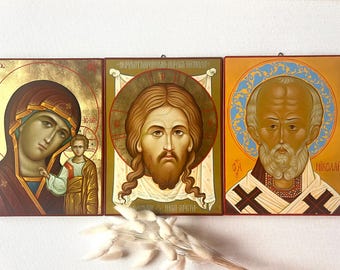 Triptych, a set of three icons: the Holy Mother of God, Jesus Christ, and St. Nicholas.
