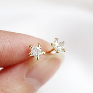 gold star earrings // sterling silver or gold vermeil . tiny minimal star studs . faceted cz crystal . celestial jewelry . second piercing