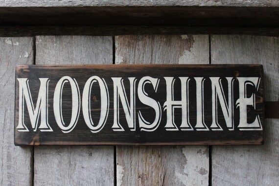 Primitive Moonshine Jug Button Tin Sign Primitive Moonshine Jug Button Tin Sign