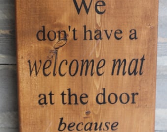 We don't have a welcome mat at our door because we're not liars Wood sign Funny Sign Funny Gift Idea Man Cave Babe Cave Bar Decor Hippie