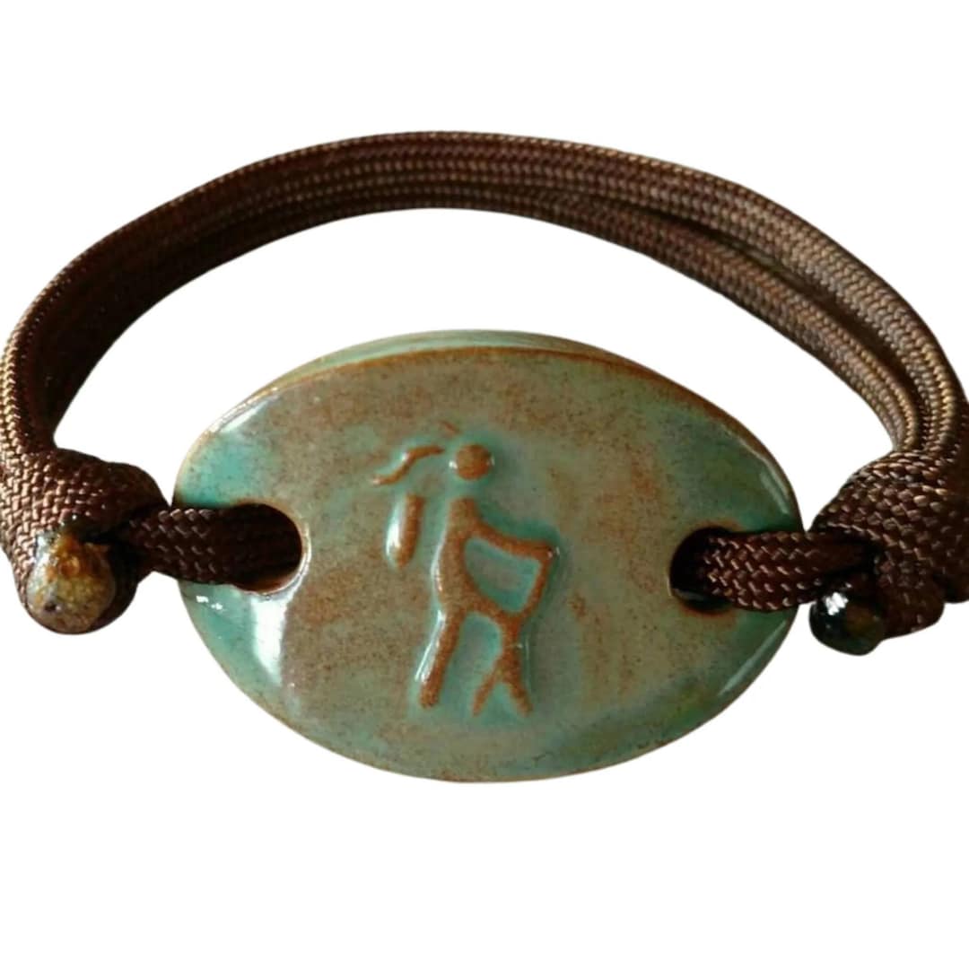 Girl Hiker in Turtle Shell With Adjustable Paracord Bracelet Hiker ...