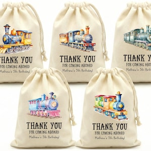 May include: Five beige drawstring bags with watercolor train illustrations. Each bag has the text "THANK YOU FOR COMING ABOARD" and "Mathew's 5th Birthday!" printed in black. The trains are in various colors.