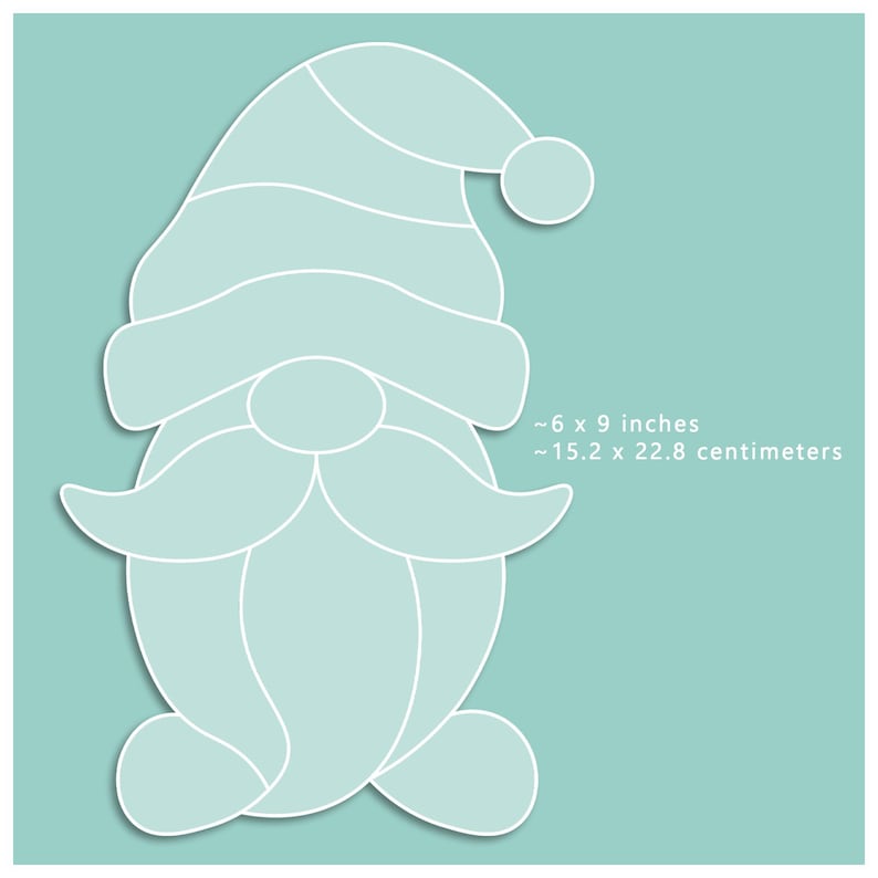 May include: A light blue gnome-shaped design with a white outline, featuring a hat, mustache, and round nose. The image includes the dimensions: approximately 6 x 9 inches.
