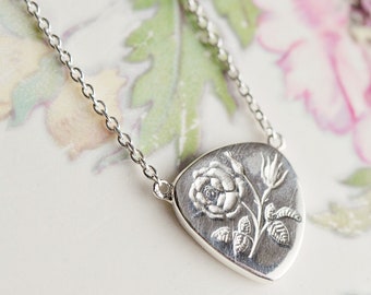 Mourning necklace | miscarriage rainbow baby stillborn baby child loss remembrance | funeral grief flower jewelry | intaglio engraved charm