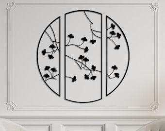 May include: Black metal wall art featuring a stylized floral design with branches and leaves. The art is divided into three sections, each with a semi-circular shape.